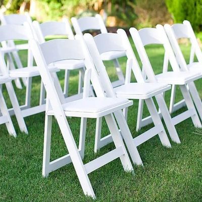 Home Office Cadeira dobrável portátil empilhável para eventos de casamento Material de madeira PP