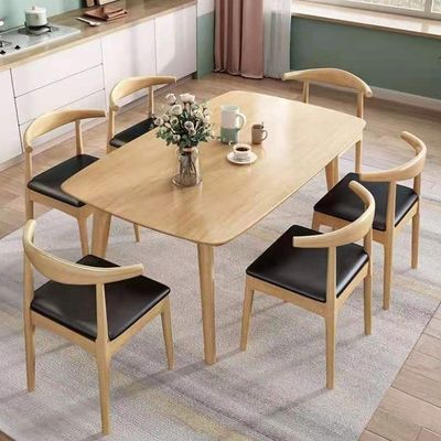 Combinação de mesa de jantar e cadeira de madeira sólida nórdica para uma mesa de jantar simples, moderna e ecológica