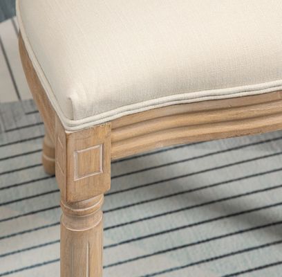Cadeira de jantar de estilo francês vintage revestida de couro PU com design empilhável e madeira maciça