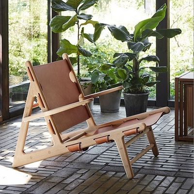 Poltrona de couro de acabamento de nitrolacquer para sala de estar moderna e confortável