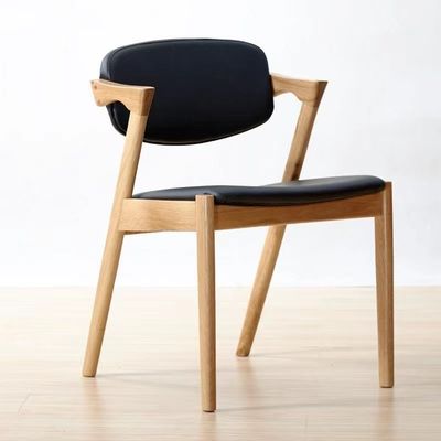 Cadeira nórdica de cor natural Cadeira de jantar moderna de madeira maciça para restaurante